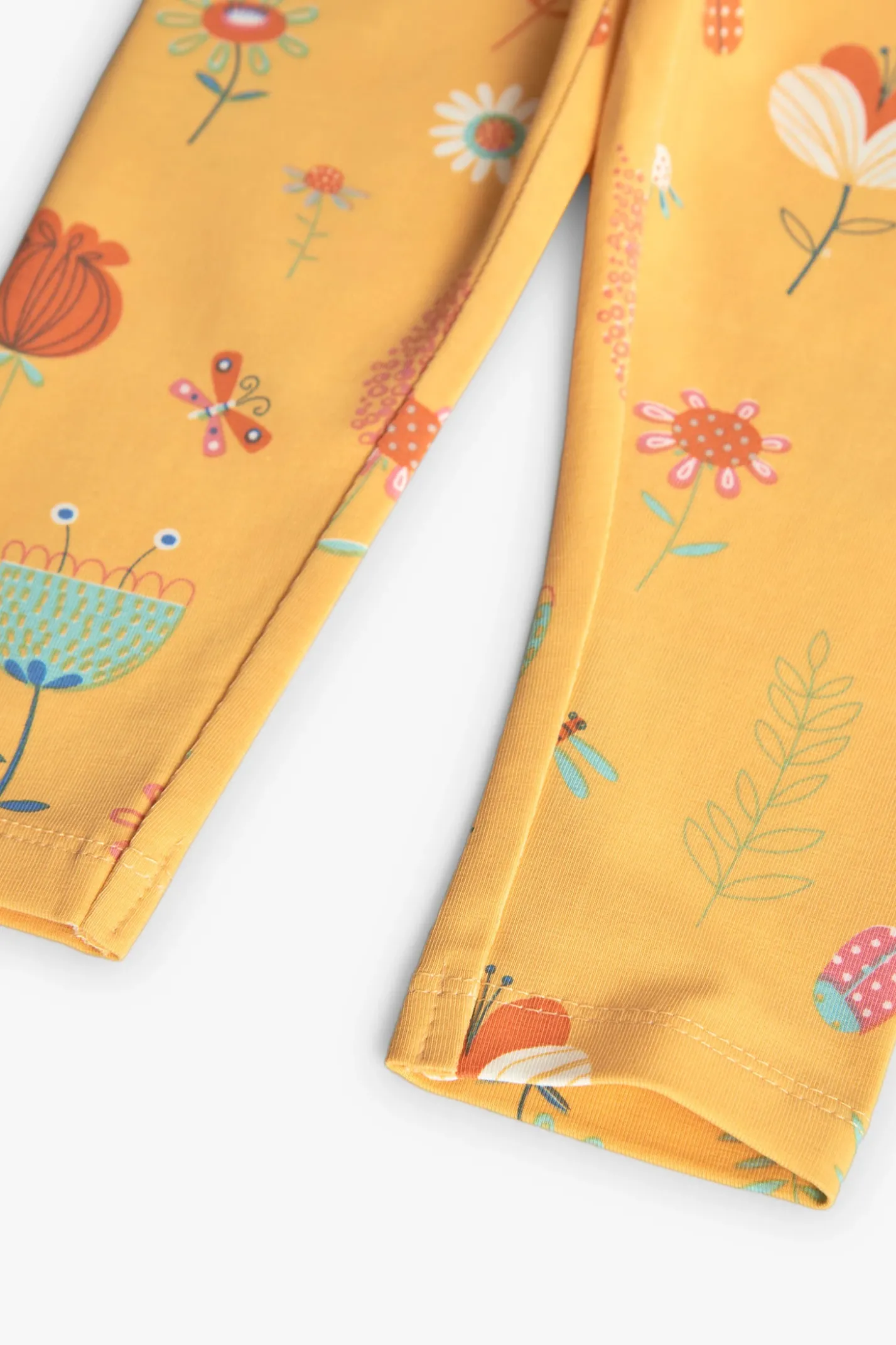 Leggings a maglia per bambina in colore giallo con stampa
