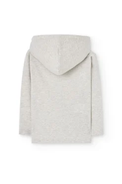Maglietta a maglia con cappuccio per bambino in color crema.