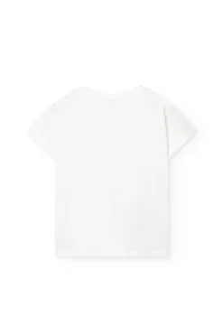 Maglietta a maglia per bambina in bianco con stampa floreale.