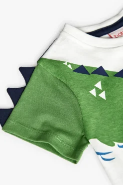 Maglietta a maglia per bambino in bianco con design di coccodrillo.