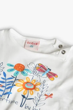 Maglietta di maglia per neonata in bianco