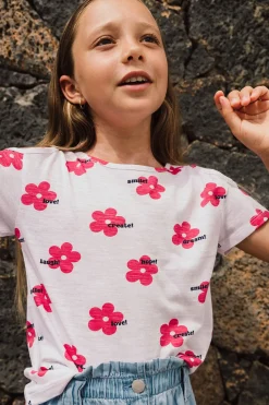 Maglietta in maglia per bambina di colore bianco con stampa floreale.