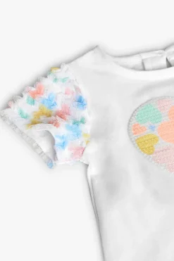 Maglietta in maglia per bambina in colore bianco con stampa a cuore.
