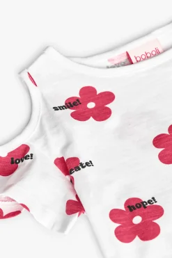Maglietta in maglia per bambina di colore bianco con stampa floreale.