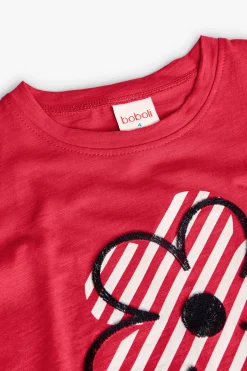 Maglietta in maglia per bambina di colore fragola con motivo floreale.