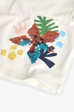 Maglietta in maglia per bambina in colore bianco con stampa grafica.