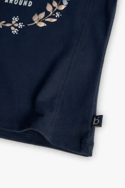 Maglietta lavorata a maglia per bambina con stampa floreale in colore blu navy.