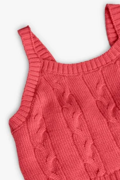 Maglione in maglia per bambina in colore fragola.