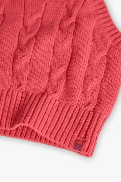 Maglione in maglia per bambina in colore fragola.