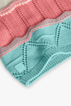 Maglione lavorato a maglia per neonata di colore giallo
