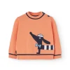 Maglione tricotoso per neonato di colore arancione