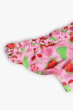 Mutandina da bagno in poliammide per bambina con stampa di frutta.