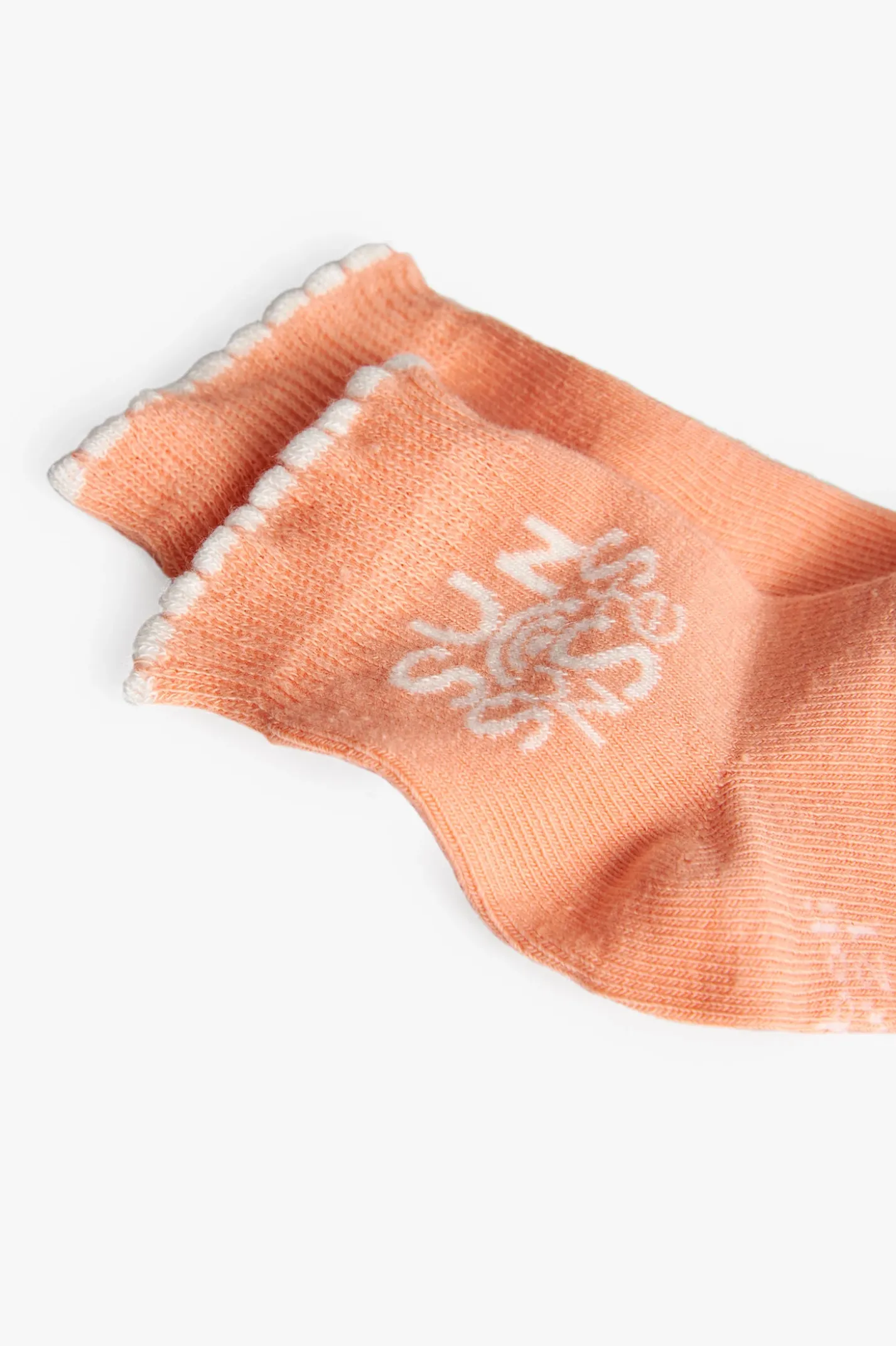Pacco di calzini a maglia in colore salmone