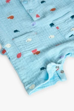 Pagliaccetto blu chiaro in maglia piatta per bambino con motivo stampato
