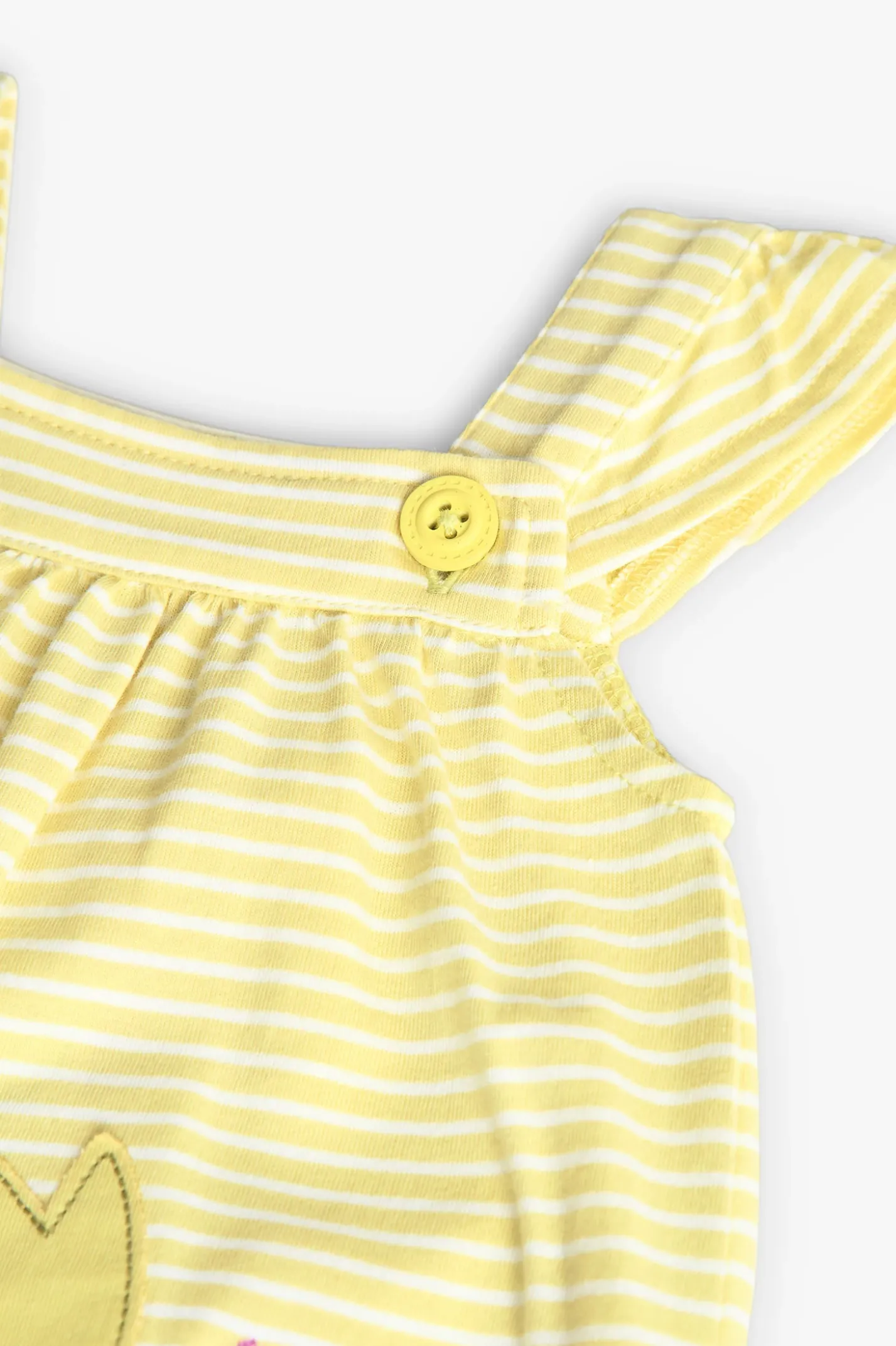Pagliaccetto in maglia per bambina in colore giallo a righe con motivo floreale.