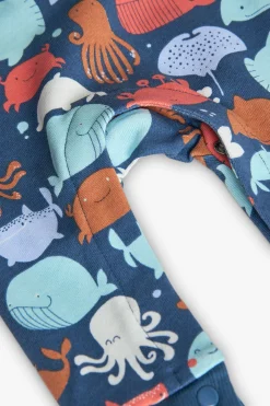 Pagliaccetto in maglia per neonato di colore blu con stampa