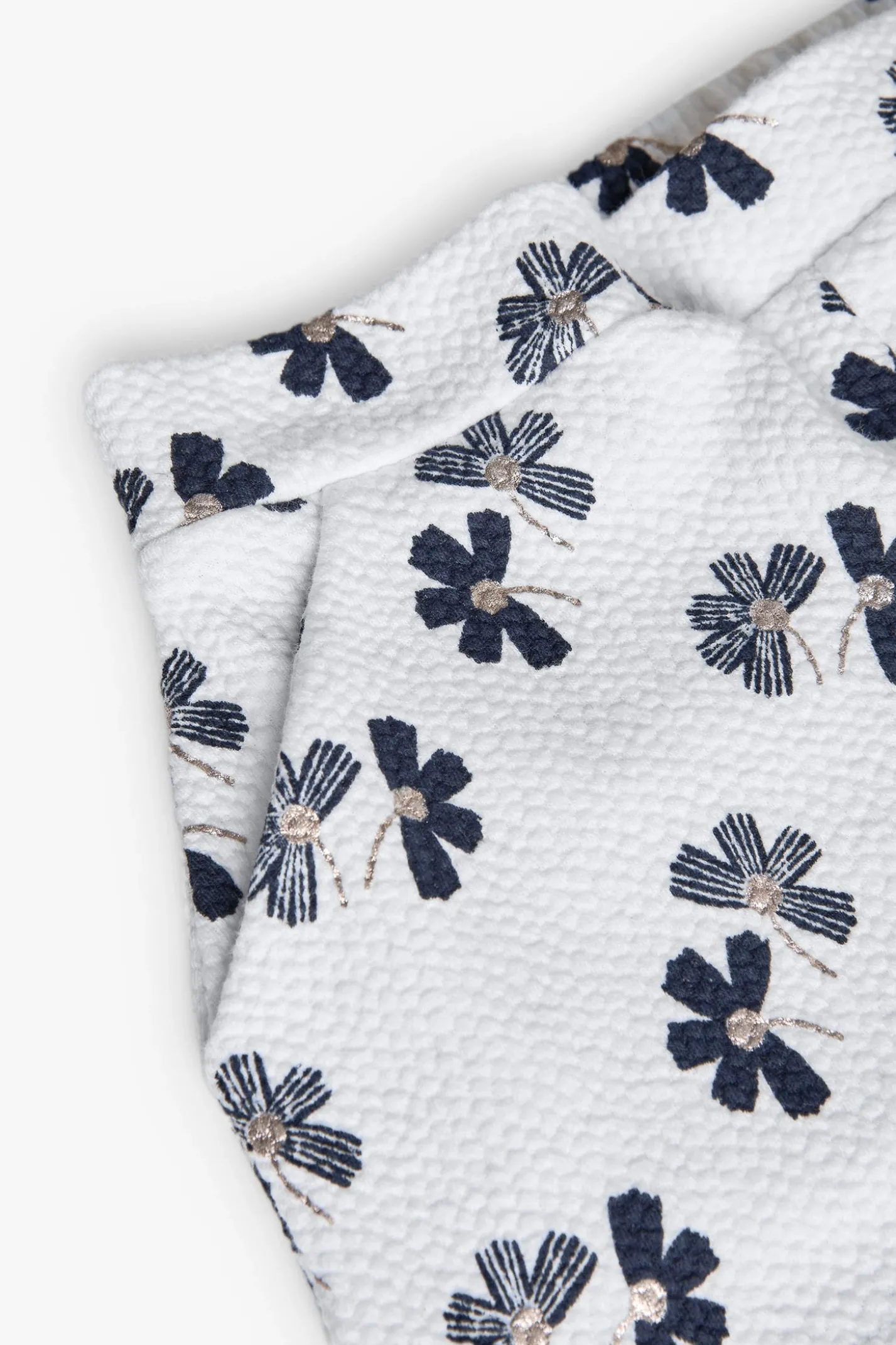 Pantaloncini in maglia per bambina con stampa floreale in bianco e blu