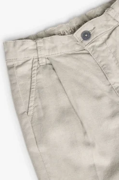 Pantaloni di lino per bambino in colore beige.