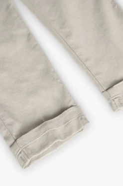 Pantaloni di lino per bambino in colore beige.