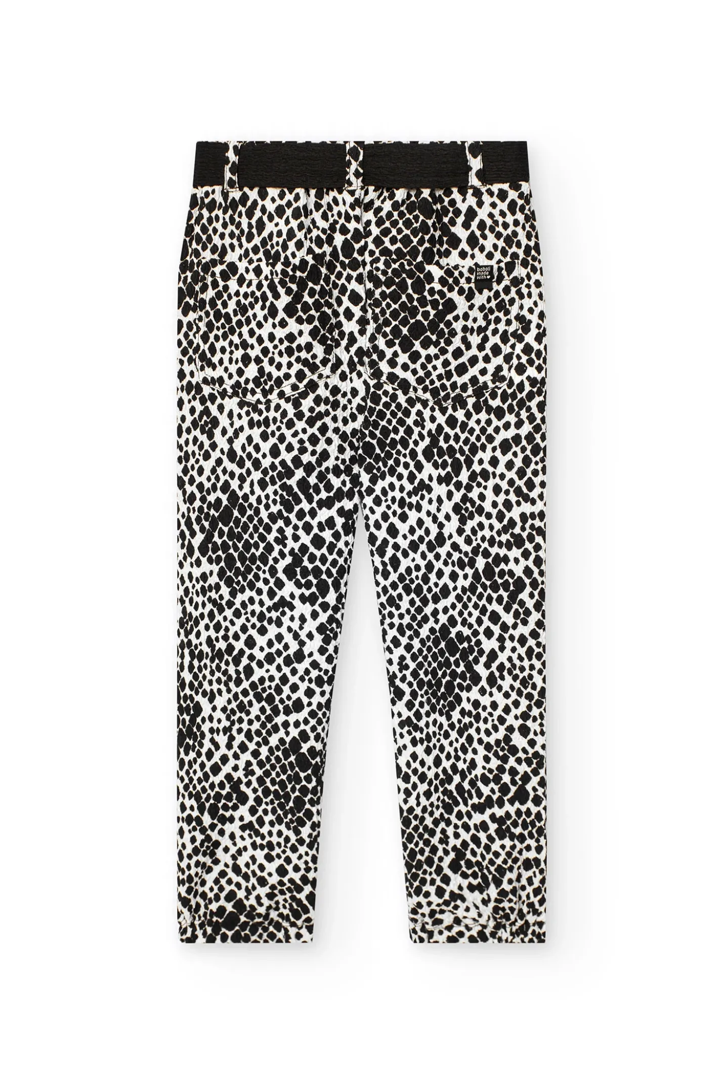 Pantaloni di maglia per bambina con stampa in bianco e nero.