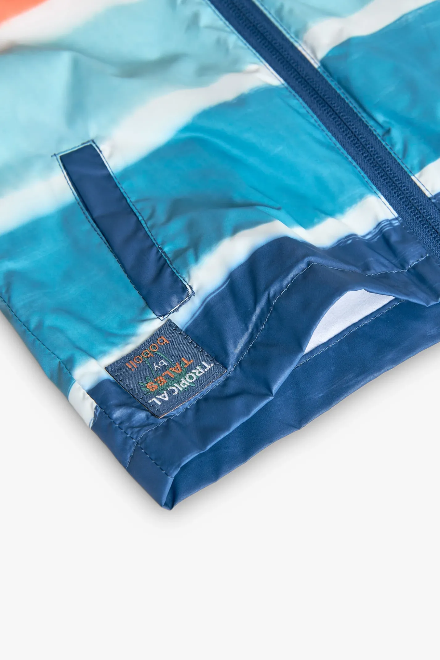 Parka per neonato con stampa in color corallo e acqua.