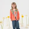 Parka reversibile per bambina in colore rosso.