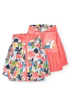 Parka reversibile per bambina in colore rosso.