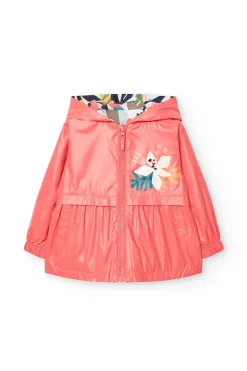 Parka reversibile per bambina in colore rosso.