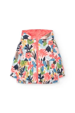 Parka reversibile per bambina in colore rosso.