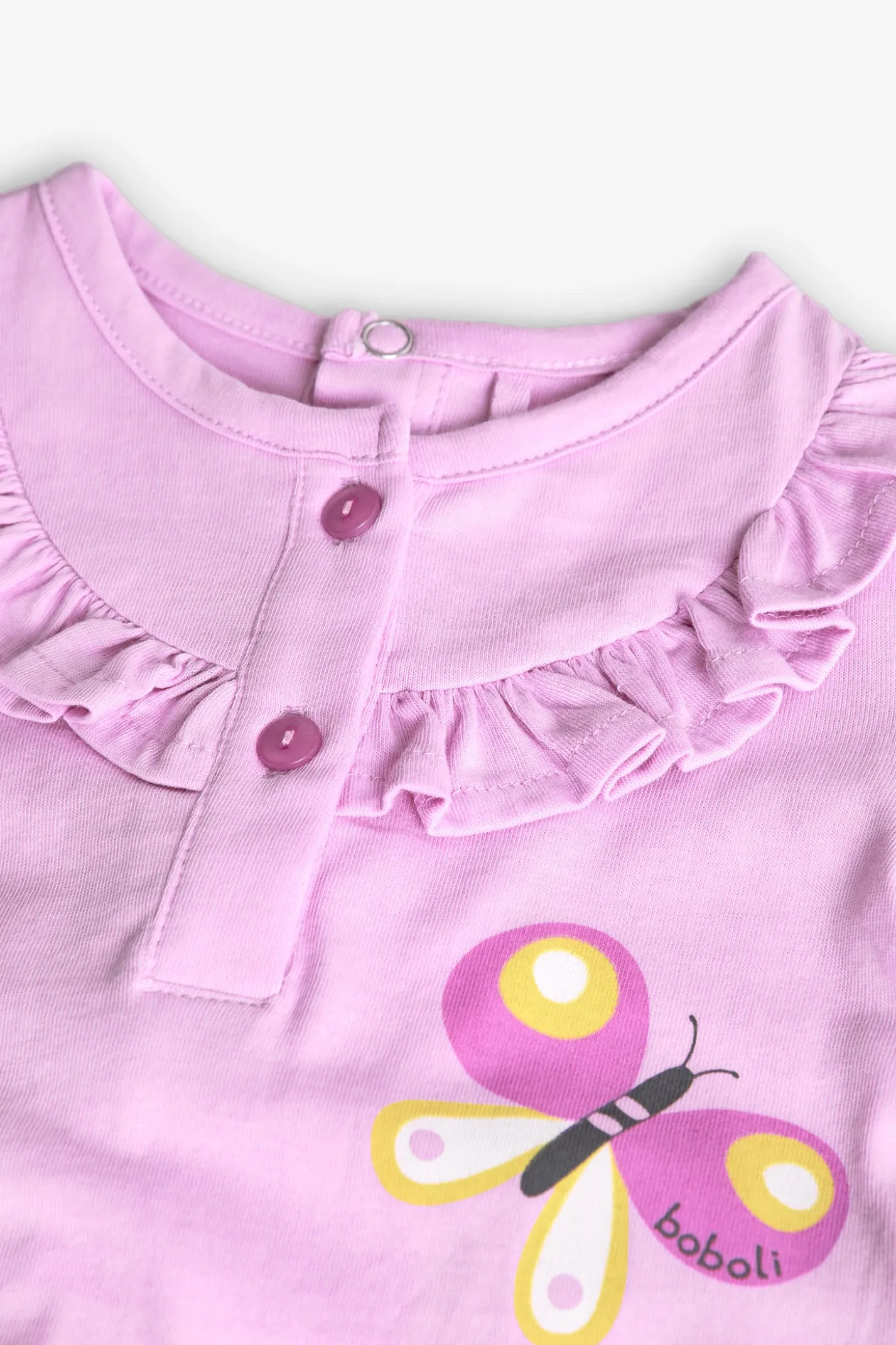 Pelele in maglia per neonata di colore rosa con stampa di farfalle e fiori.
