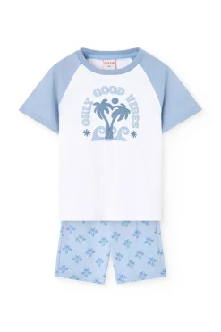 Pigiama corto in maglia per bambino con stampa in colore blu.