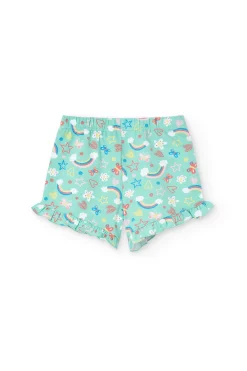 Pigiama in maglia per bambina con stampa di arcobaleni e fiori in tonalità verdi.