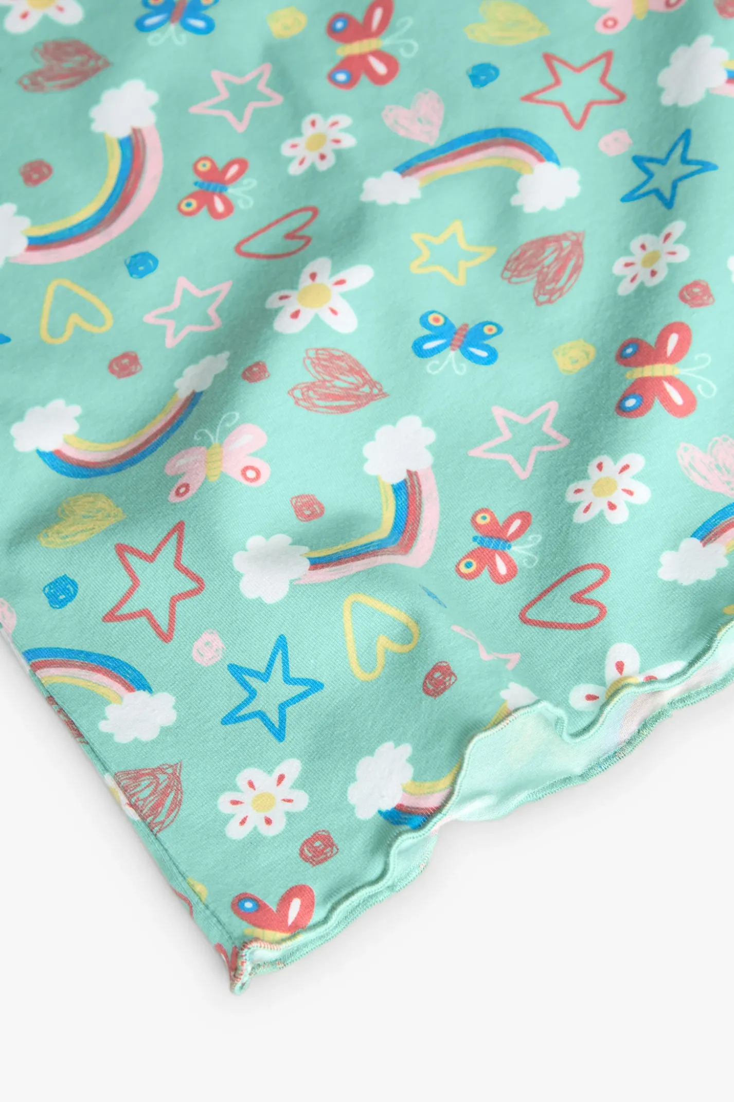 Pigiama in maglia per bambina con stampa di arcobaleni e fiori in tonalità verdi.