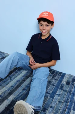 Polo in piqué per bambino di colore blu navy