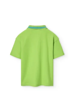 Polo in piqué per bambino di colore verde.