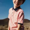 Polo piqué per bambino con stampa in colore rosa