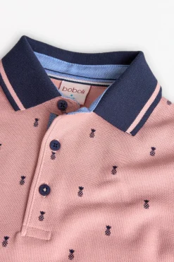 Polo piqué per bambino con stampa in colore rosa