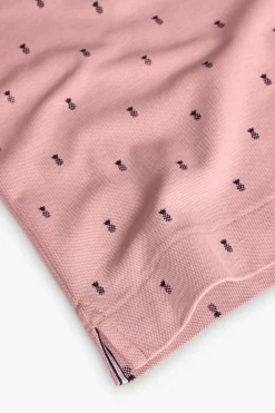 Polo piqué per bambino con stampa in colore rosa