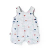 Salopette in popeline per bambino in colore bianco con stampa a quadri in blu e rosso.