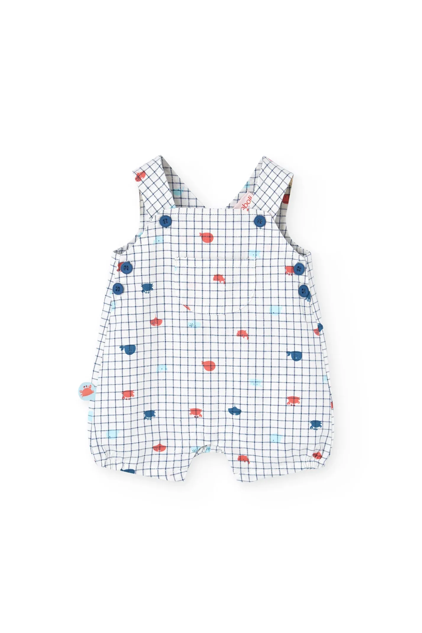 Salopette in popeline per bambino in colore bianco con stampa a quadri in blu e rosso.