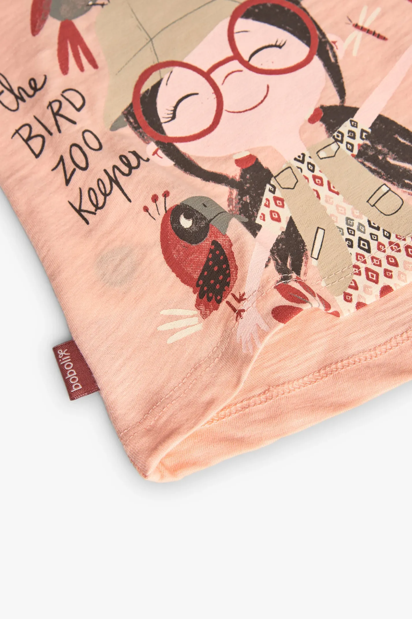 Set composto da maglietta e pantalone a maglia per neonata in colore salmone.