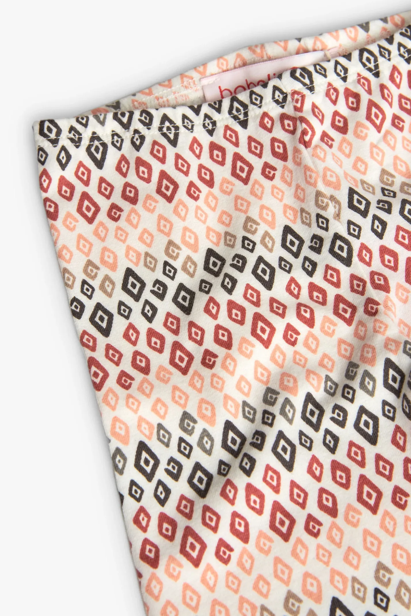 Set composto da maglietta e pantalone a maglia per neonata in colore salmone.