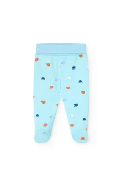 Set di maglieria per neonato in colore bianco.