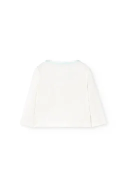 Set di maglieria per neonato in colore bianco.