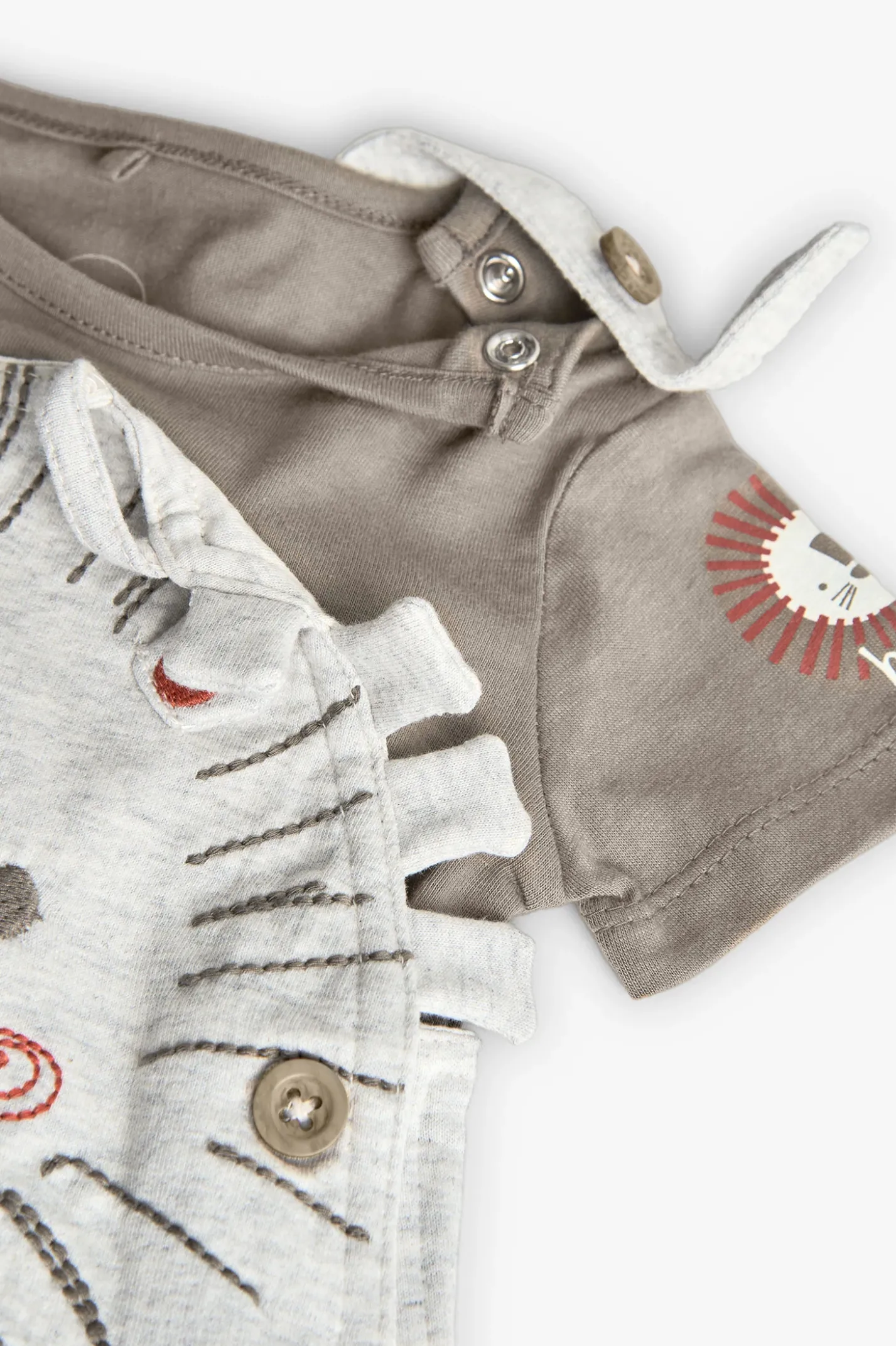 Set di maglietta a maglia per neonato in colore marrone.