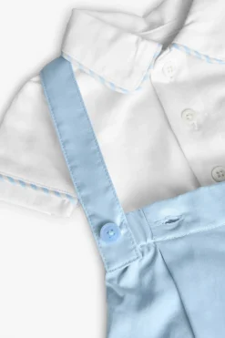 Set di maglietta e pantaloncini in maglia per neonato di colore blu.
