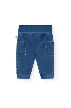 Set di maglietta in maglia per neonato di colore bianco e pantalone in blu.