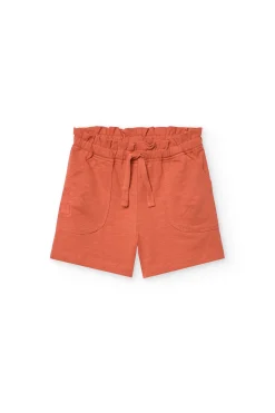 Short in maglia per bambina in colore arancione