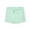 Shorts in felpa per bambina di colore verde.