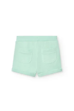 Shorts in felpa per bambina di colore verde.
